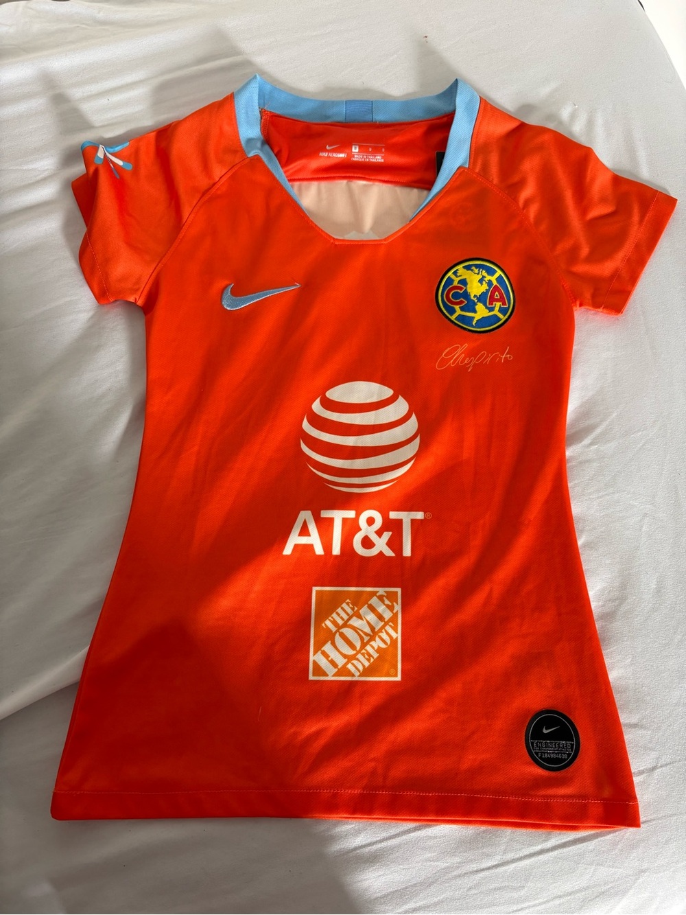 Nike Women's Orange Club América Jersey with Light Blue Accents